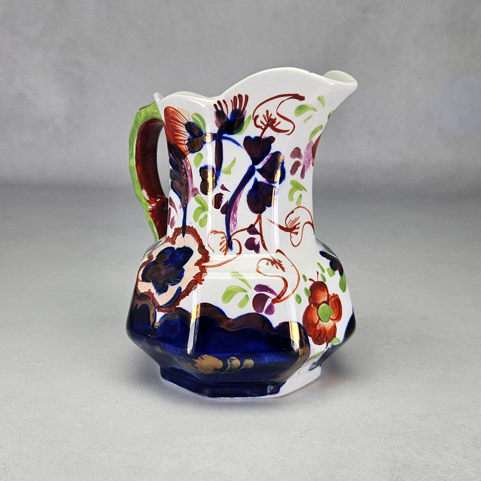 Allertons serpent handle jug with visible decorative details