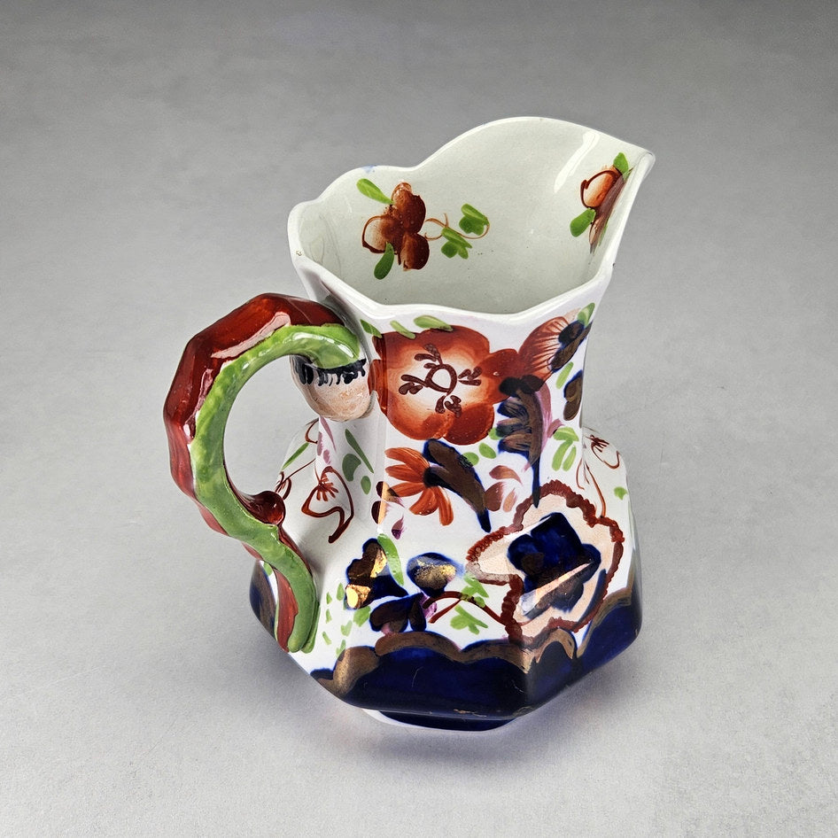 Allertons serpent handle jug showing its shaped ceramic form