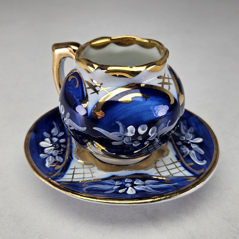 AY Aveiro cup and saucer showing floral brushwork