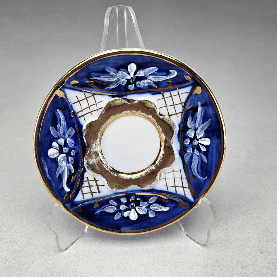 Aveiro saucer with cobalt lattice and hand-painted flowers