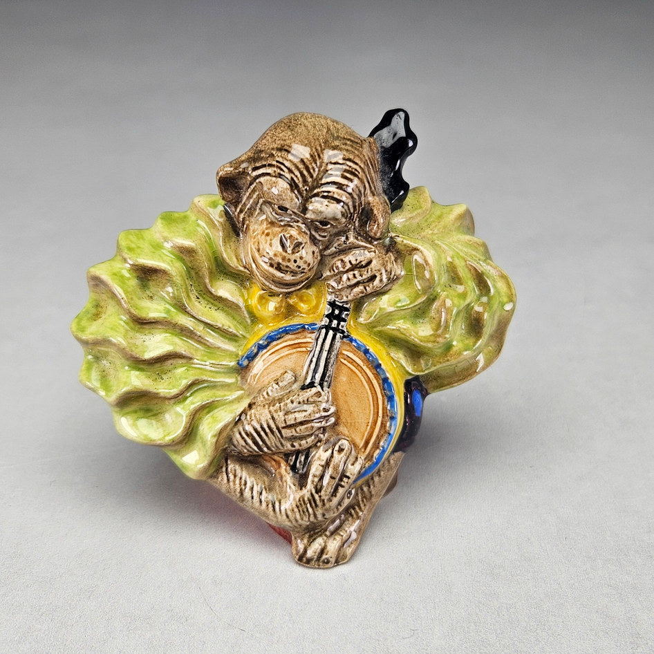 Beswick monkey playing banjo figurine, ceramic product view 1