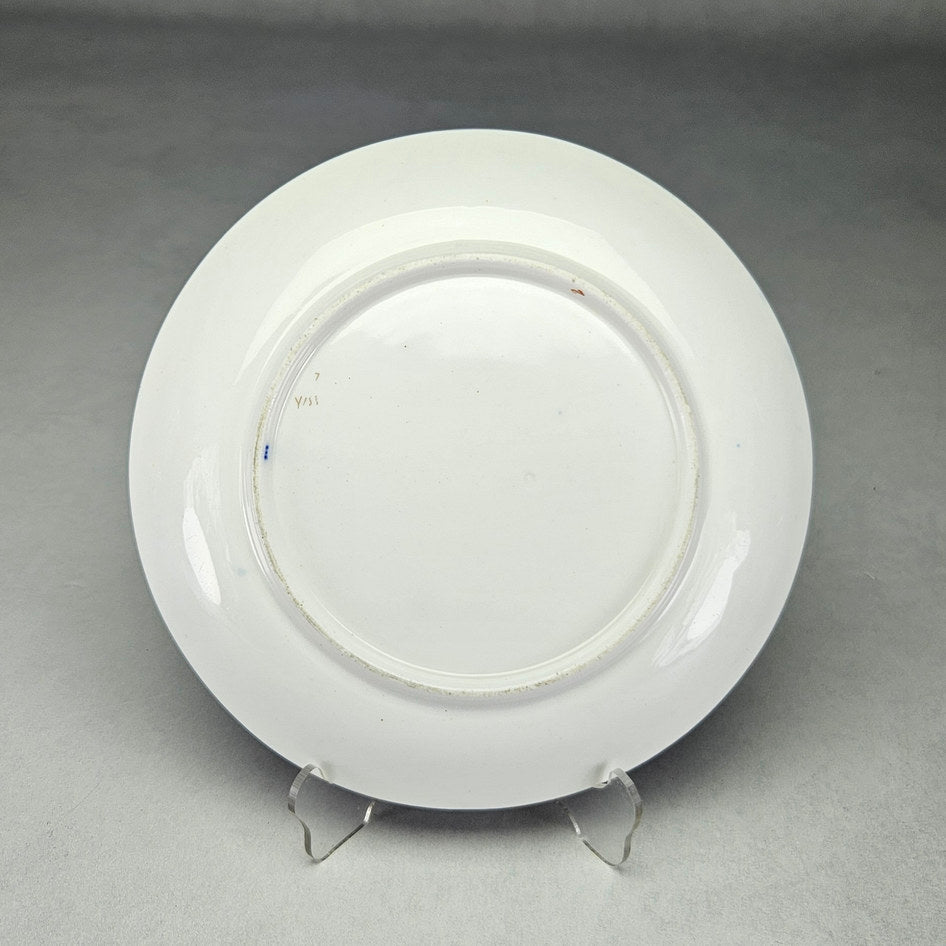 Underside of Coalport saucer with plain white base