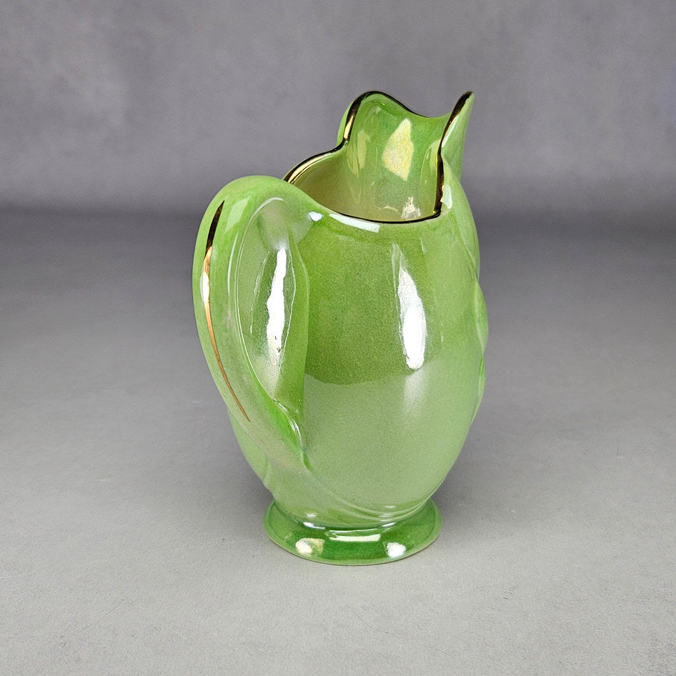 Maling green lustre leaf jug showing raised botanical decoration and handle