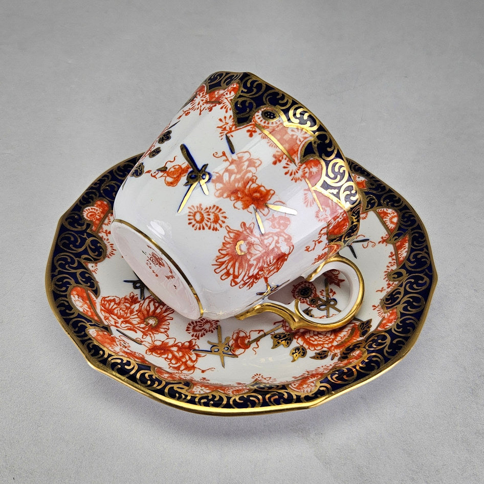 Royal Crown Derby cup with gold-trimmed handle and rim