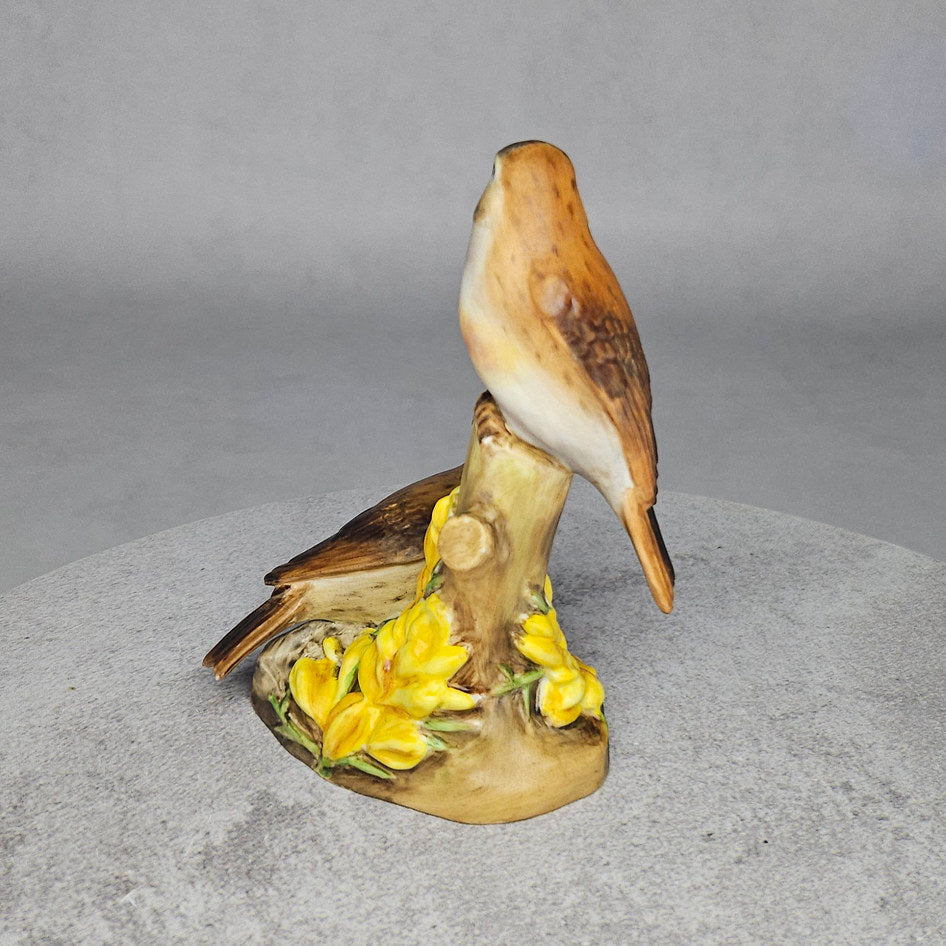 Pair of linnets figurine on flowering tree base, rear view