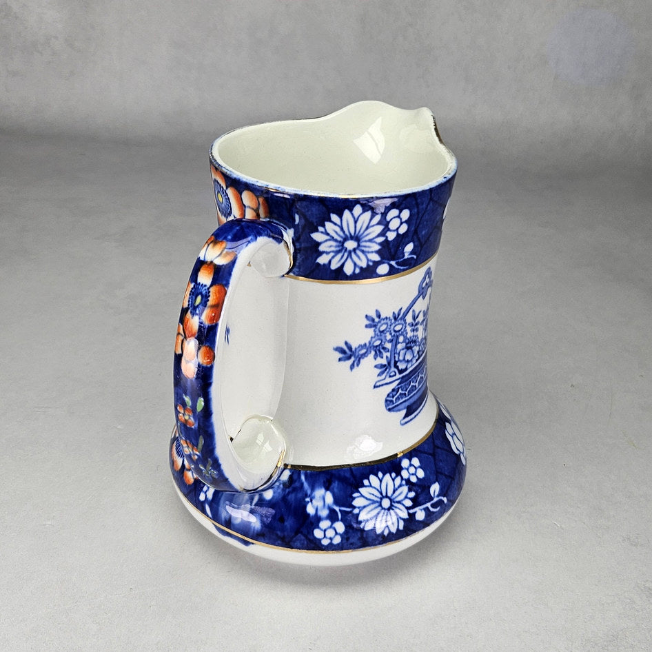 Wood and Sons Mancarn jug showing cobalt borders and orange flowers